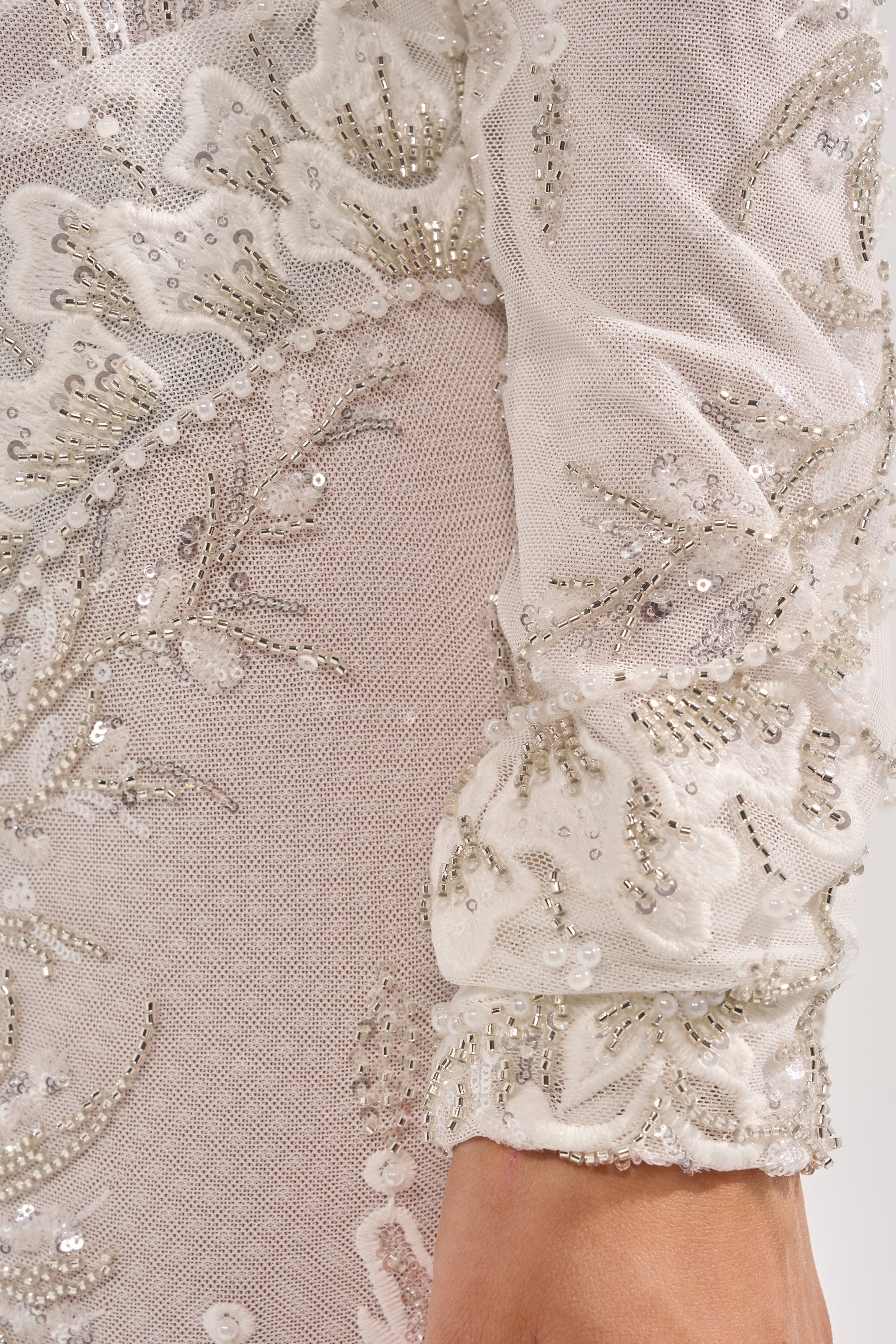 WATCH ME WORK EMBELLISHED SEQUIN JUMPSUIT IN WHITE