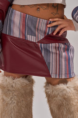 FEELING THE VIBES MINI SKIRT