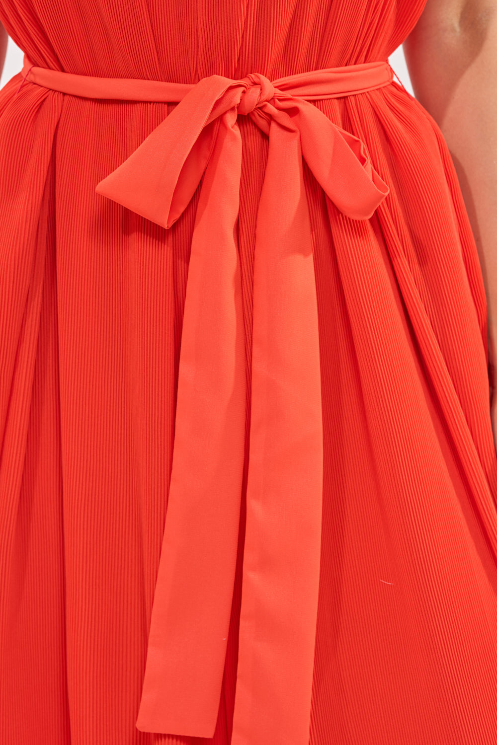 VACATIONING PLEATED JUMPSUIT IN ORANGE