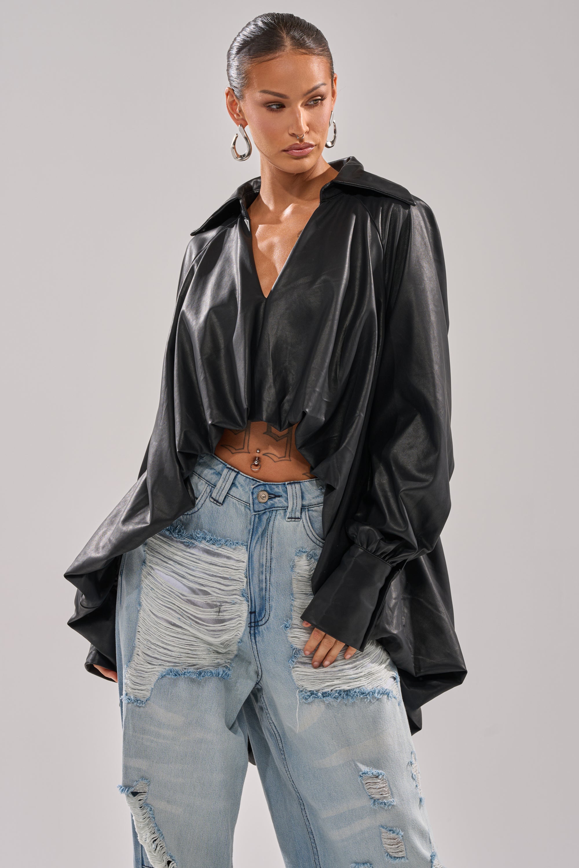 NEW ATTITUDE FAUX LEATHER HI-LOW BLOUSE