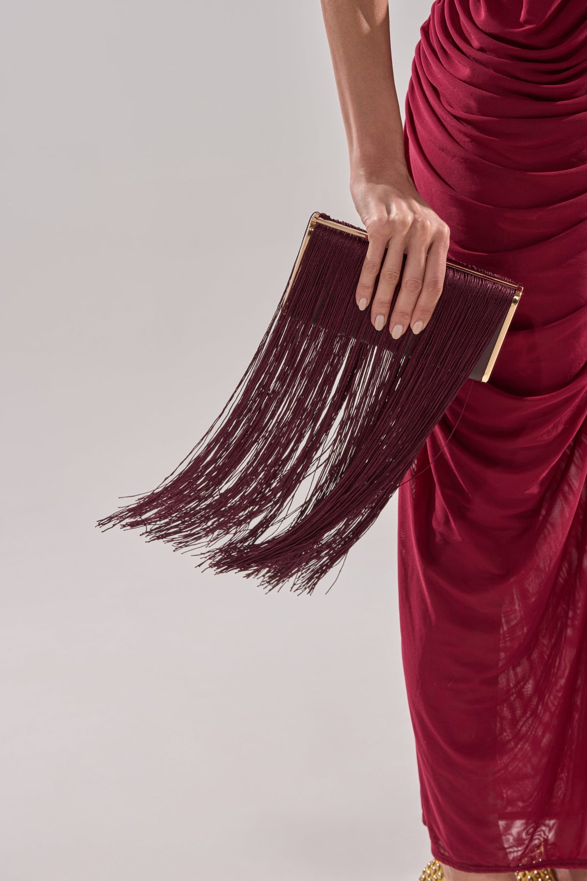 IN THE FRINGE CLUTCH