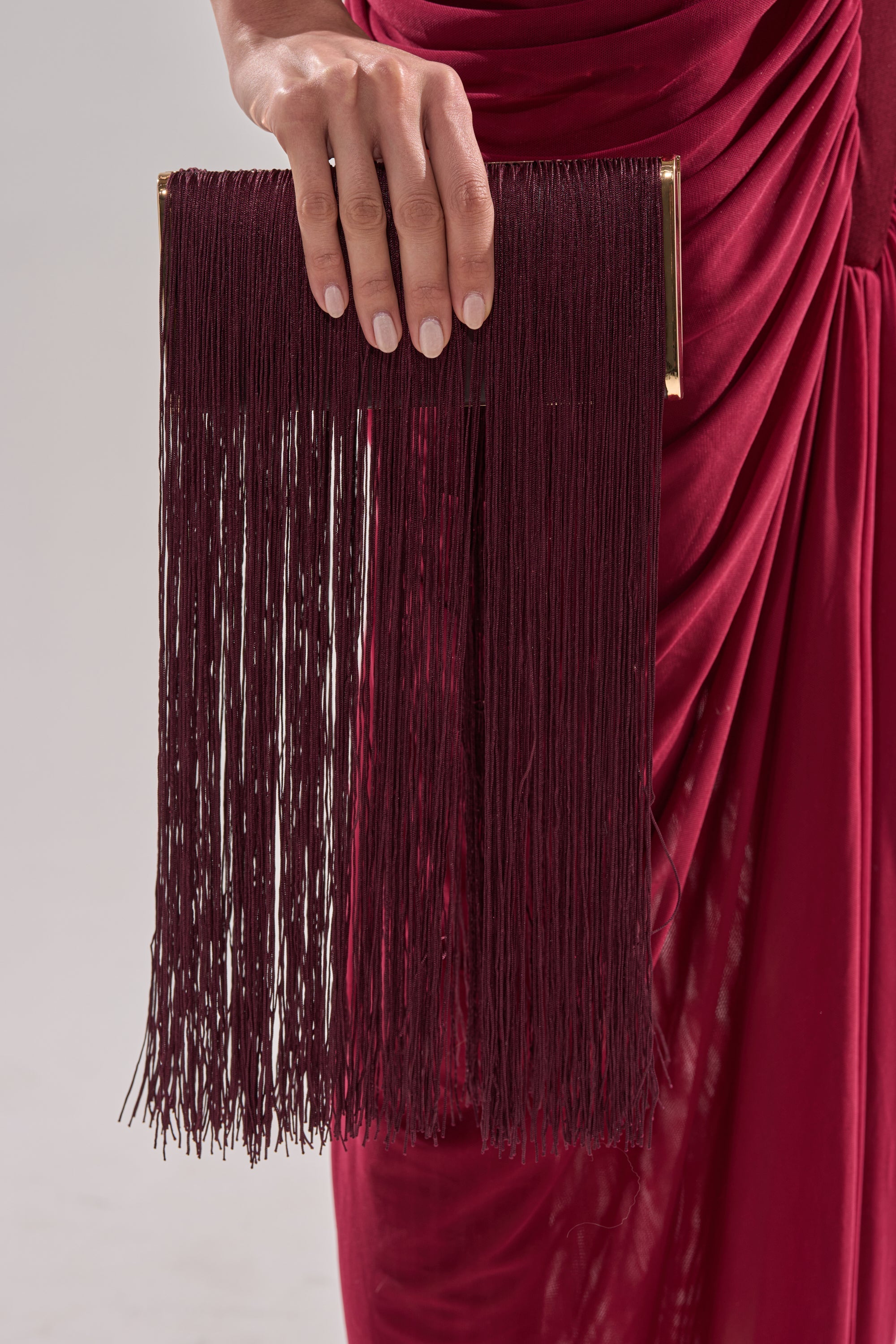 IN THE FRINGE CLUTCH