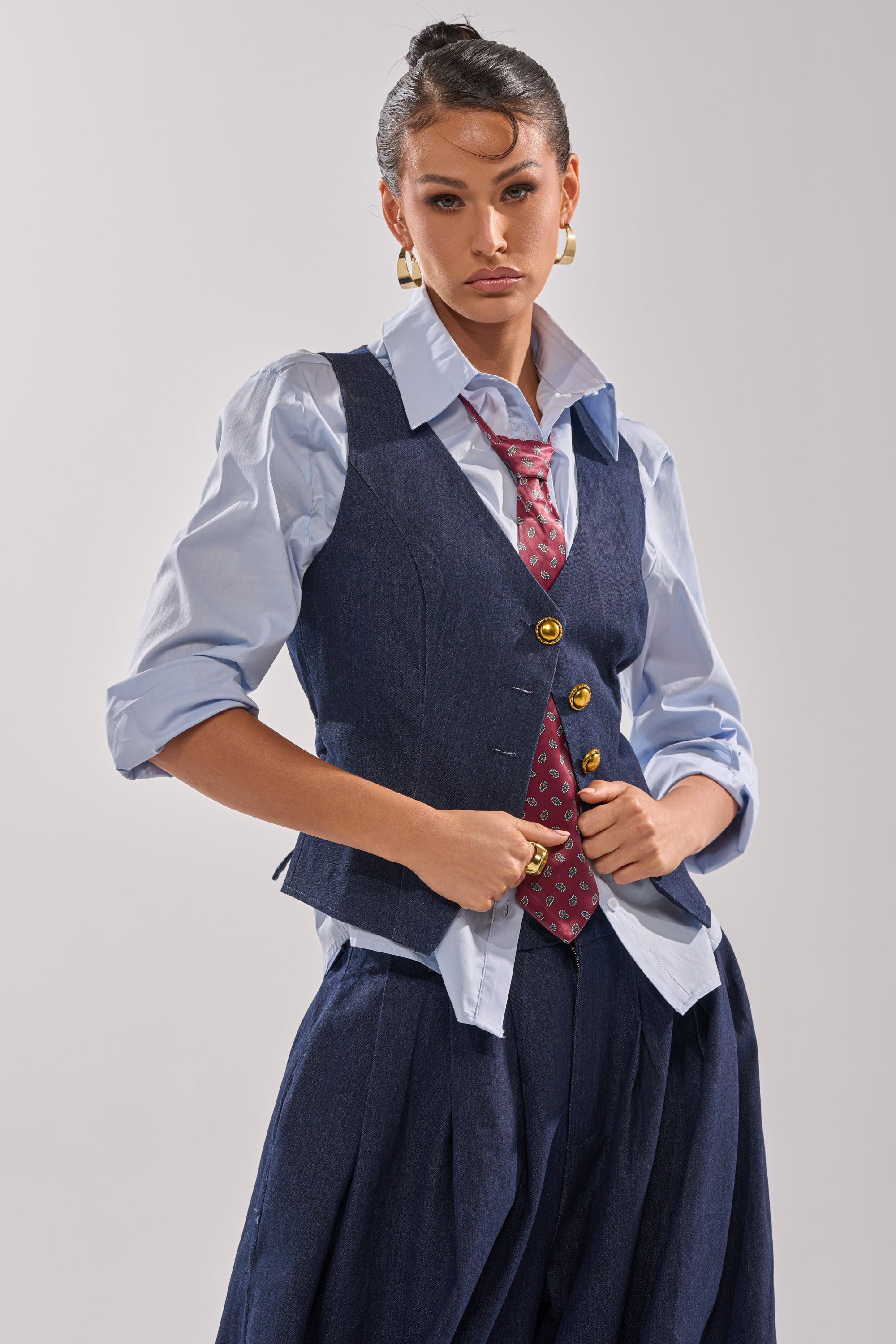 BUSINESS IN THE FRONT VEST