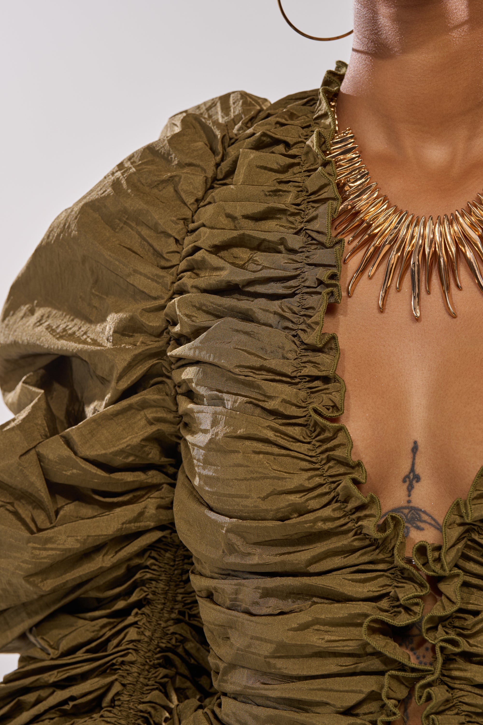 IN IT TO WIN IT RUCHED BLOUSE