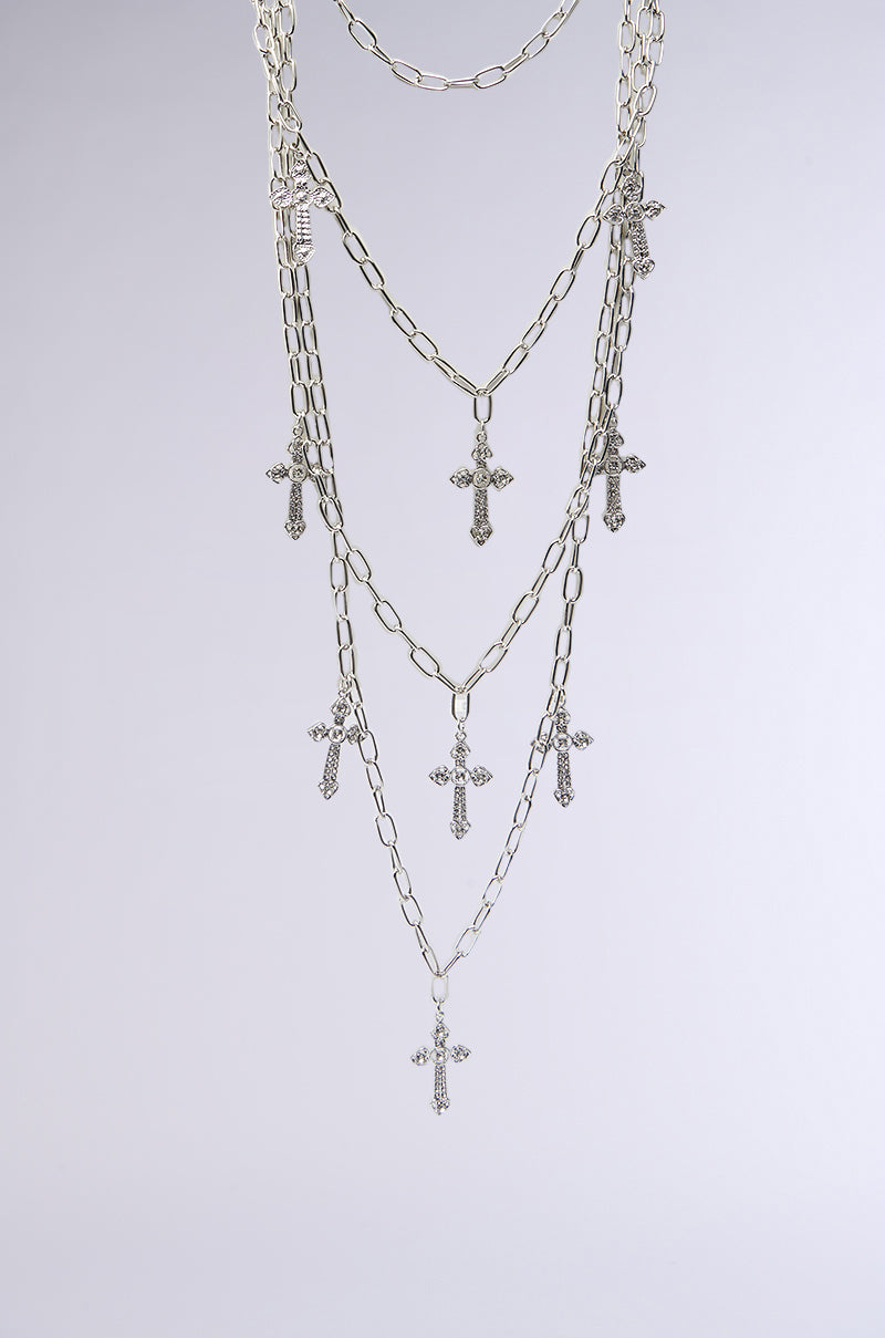 LAYERS TO THIS CROSS NECKLACE