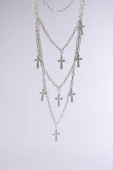 LAYERS TO THIS CROSS NECKLACE