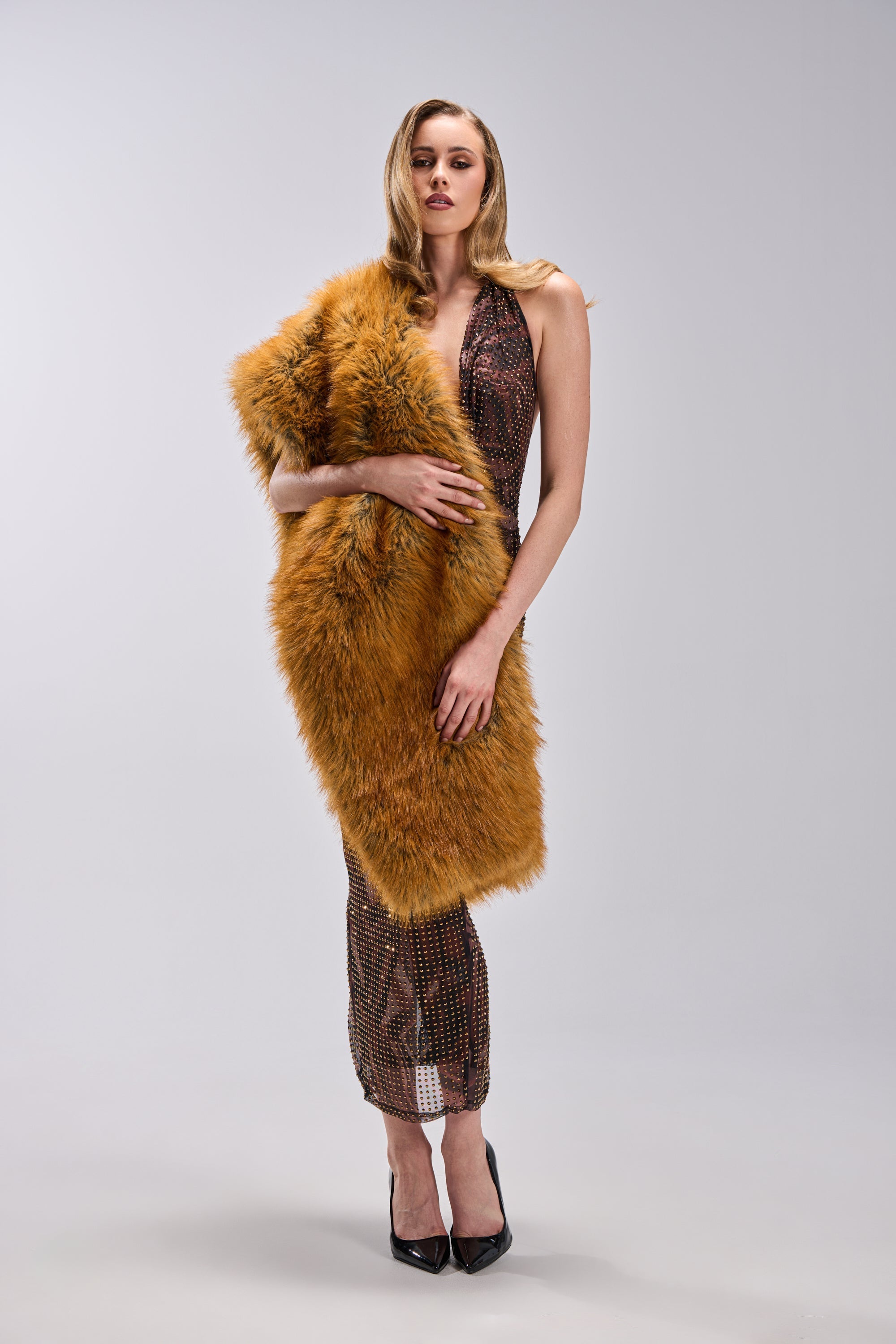 REALLY LIKE THAT FAUX FUR SCARF