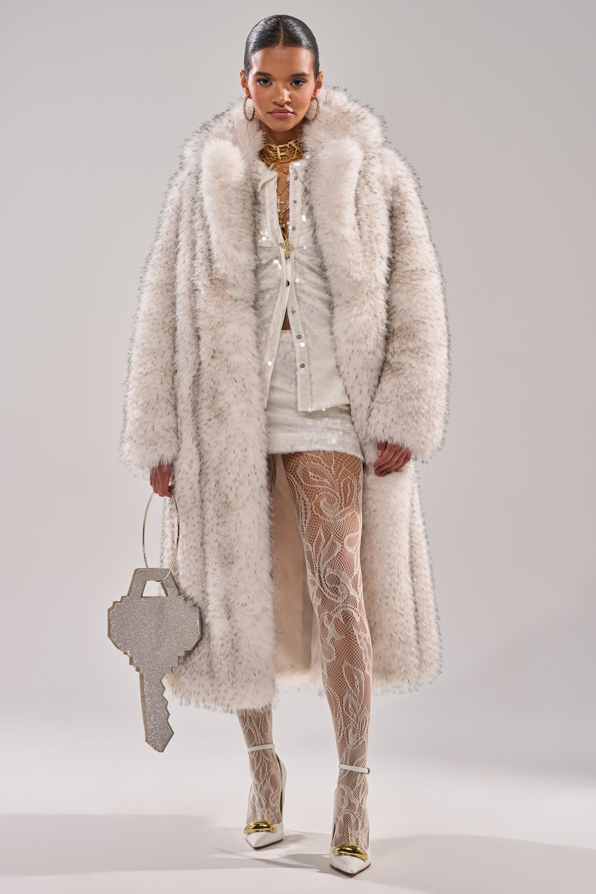 HEAVY ON THE APRES FAUX FUR COAT