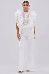 WALK THAT WALK RUFFLE JUMPSUIT IN WHITE
