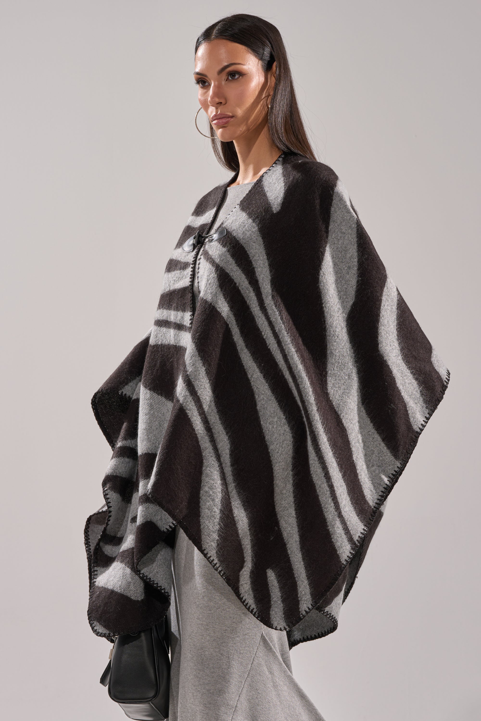 WILD CHILD KNIT PONCHO
