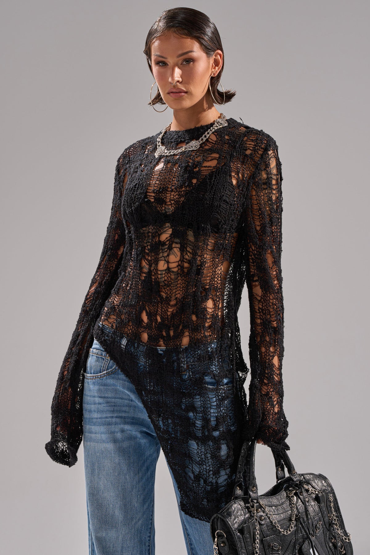 ASYMMETRICAL KNIT SWEATER