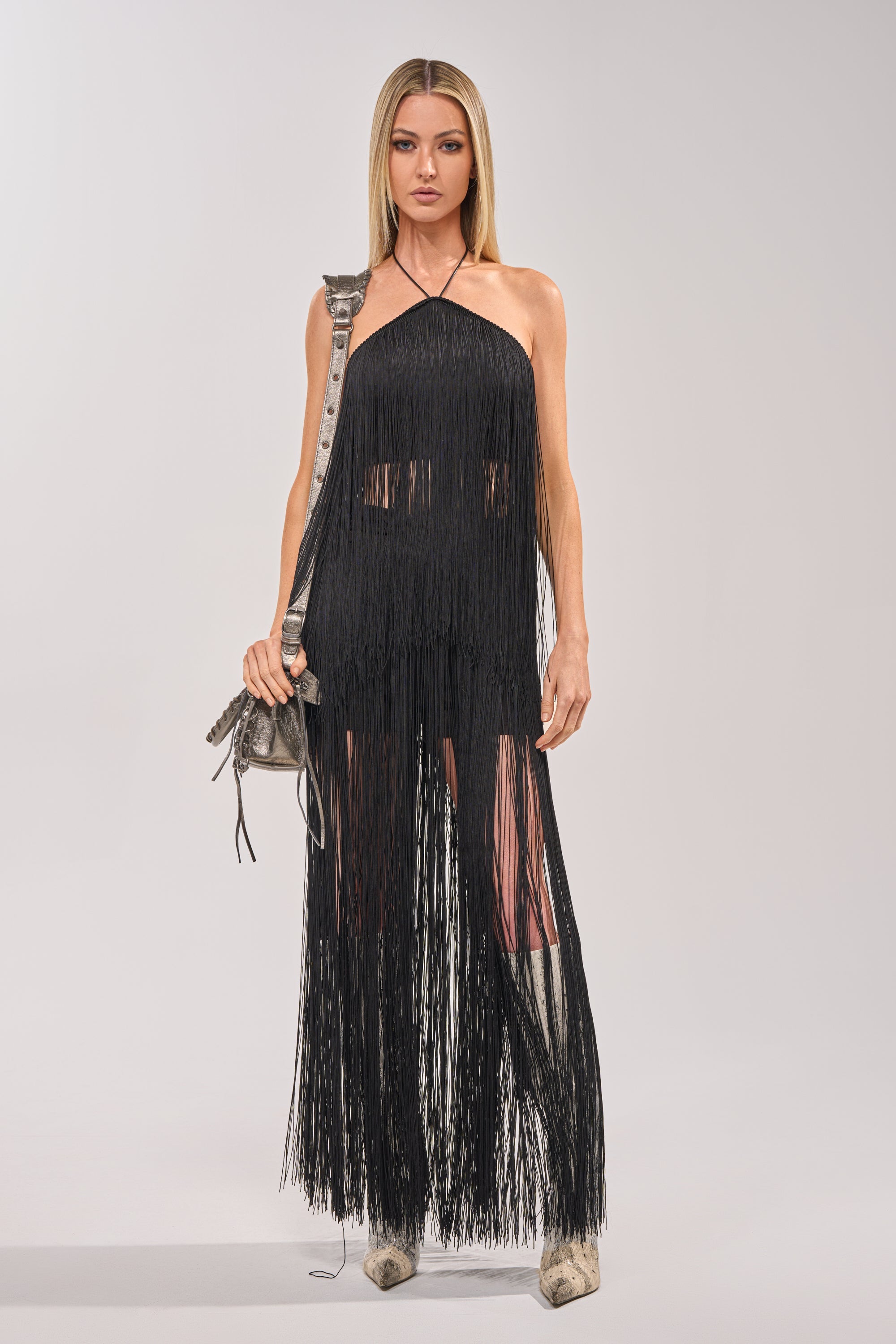 ON THE EDGE FRINGE SKIRT IN BLACK
